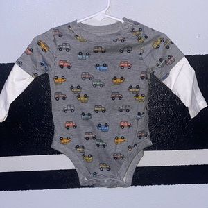 Size: 6-9 months - White and grey long sleeve onesie with cars